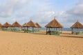 Beach hut with blue sky and sandy beach Royalty Free Stock Photo