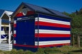 Beach hut in red white blue colors Royalty Free Stock Photo