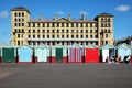 Beach huts and buildings on Brighton promenade Royalty Free Stock Photo