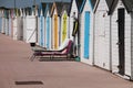 Beach huts in different colours in England.