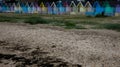 Beach Huts in England after a storm in West Mersea, England UK