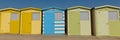 Beach huts with green blue and yellow colours and blue sky panoramic view Royalty Free Stock Photo