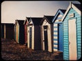 Beach huts on the sand on a cold winter day Royalty Free Stock Photo