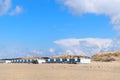 Beach huts and seagulls at the beach Royalty Free Stock Photo