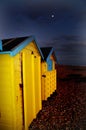 Yellow Beach huts in the evening winter moonlight