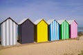 Beach huts wooden bathing boxes on sandy beach Royalty Free Stock Photo