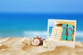 Beach with instant photo in front of sea background Royalty Free Stock Photo