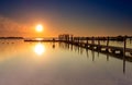 Beach jetty and outdoor swimming pool in Zeewolde during sunrise
