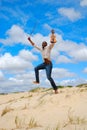 Beach jumping man Royalty Free Stock Photo