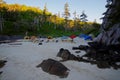 Beach, kayaks and tents, early morning light, Great Bear Rainforest, British Columbia Royalty Free Stock Photo