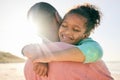 Beach, kid and happy black family hug, embrace and bond on outdoor vacation for peace, freedom and quality time Royalty Free Stock Photo