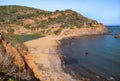 Beach and lake laghetto of terranera, a natural bay with black sand and free public beach near Porto Azzurro, Island of Elba, I