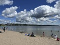 Beach at Lake Simcoe in Barrie, Ontario People and an Umbrealla Royalty Free Stock Photo