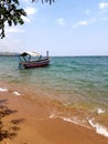 A small fishing boat awaits on lake tanganyka
