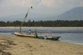 Beach on Gili islands, Bali: colored wooden boats