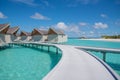 Beach landscape of the over water bungalows at luxury tropical resort