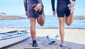 Beach legs, rowing and stretching people, partner or couple of friends for fitness, teamwork and start workout routine Royalty Free Stock Photo