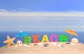 Beach letters on a beach sand