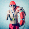 Beach lifeguard boy Royalty Free Stock Photo