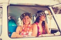 Beach Lifestyle Surfer Girls in Vintage Surf Van Royalty Free Stock Photo