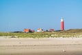 Beach and lighthouse De Cocksdorp, Texel, Netherlands Royalty Free Stock Photo