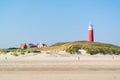 Beach and lighthouse De Cocksdorp, Texel, Netherlands Royalty Free Stock Photo