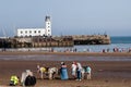 Beach and lighthouse in summer