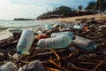 Beach littered with used plastic bottles, highlighting environmental pollution Royalty Free Stock Photo