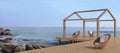 Beach living - beach lounge chair and Sea view Beautiful Royalty Free Stock Photo