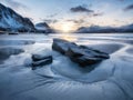 Beach on the Lofoten islands, Norway. Mountains, beach and clouds during sunset. Evening time. Winter landscape near the ocean. Royalty Free Stock Photo