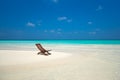 Beach lounger on sand beach Royalty Free Stock Photo