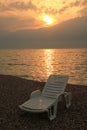 Beach lounger at sunset, garda lake, italy Royalty Free Stock Photo