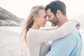 Beach, love and couple touching head on holiday, vacation and romantic weekend for anniversary. Intimacy, marriage and Royalty Free Stock Photo