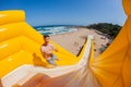 Beach Man Jump Rides High Water Slide Royalty Free Stock Photo