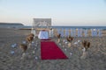 Beach marriage proposal on romantic dinner at sunset Royalty Free Stock Photo