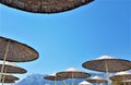 Beach straw umbrellas on Mediterranean sea in Kemer, Turkey