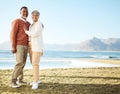 Beach, mockup and happy senior couple on vacation or holiday together with love in nature at the sea or ocean. Elderly Royalty Free Stock Photo