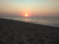 Beach morning red sun sunrise sand the black sea the waves Royalty Free Stock Photo