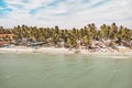 The beach in Mui Ne village. Palm trees, resort houses, street cafes. Province of Binh Thuan, Phan Thiet, Royalty Free Stock Photo