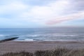 Beach near Domburg town in spring fresh morning with cloudy sky