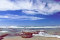 Beach near Mosselbay South Africa during morning sunshine under a cloudy sky. Royalty Free Stock Photo