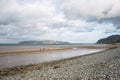 Beach in North Wales with many rocks and pebbles on it Royalty Free Stock Photo