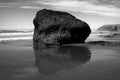 Beach. Ocean. Big stone. Rocks. Black and white Royalty Free Stock Photo