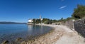 Beach at old Dominican monastery and Zlatni rat in background, Bol, Island of Brac, Croatia