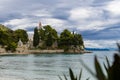 Beach at old Dominican monastery and Zlatni rat in background, Bol, Island of Brac, Croatia