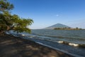 Beach in the Ometepe Island in Lake Nicaragua, with a volcano on the background, in Nicaragua Royalty Free Stock Photo