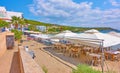 Beach with open air cafe in Agia Marina