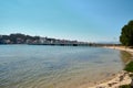 Beach overlooking the famous bridge of the island of la toja