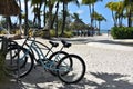 Beach With A Pair Of Parked Electric Bikes