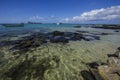 Beach panoramic view of Cap Malheureux with Coin de Mire in the distance- Mauritius Royalty Free Stock Photo